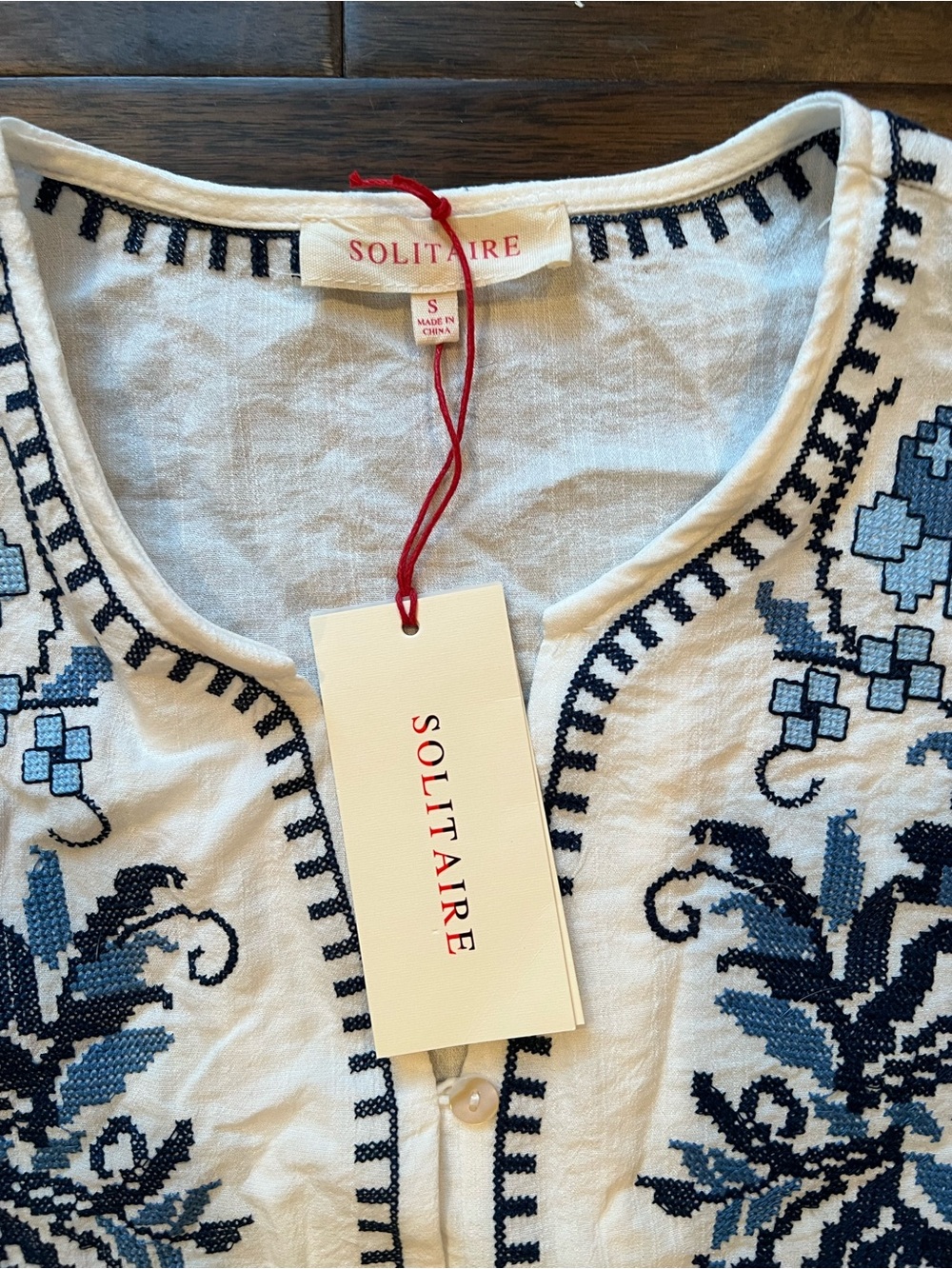 SOLITAIRE White Peplum Top with Blue Floral Embroidery - Picture 5 of 10